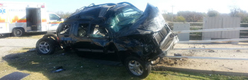Photo of an SUV roll over accident